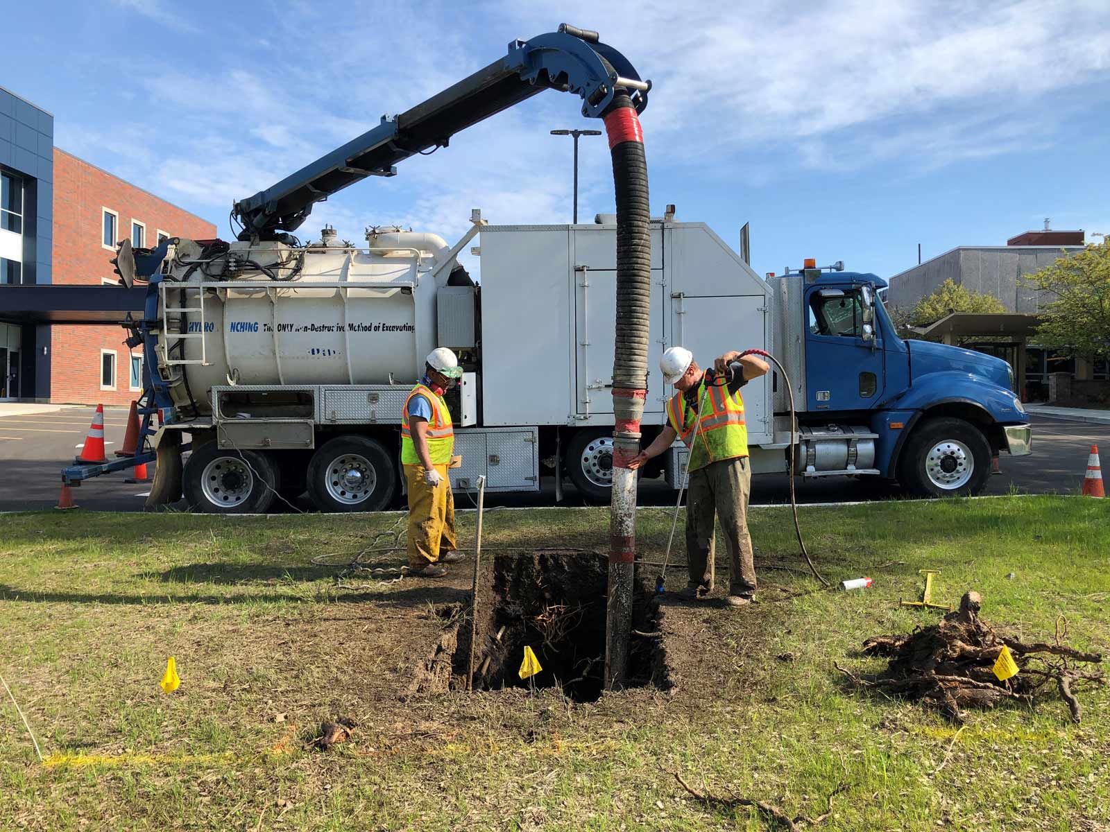 truck and workers on site for hydro excavation